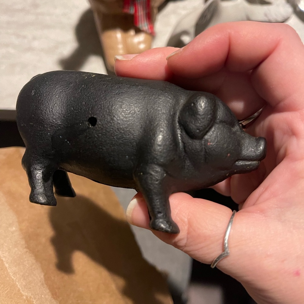 Vintage antique cast iron pig with coin slot